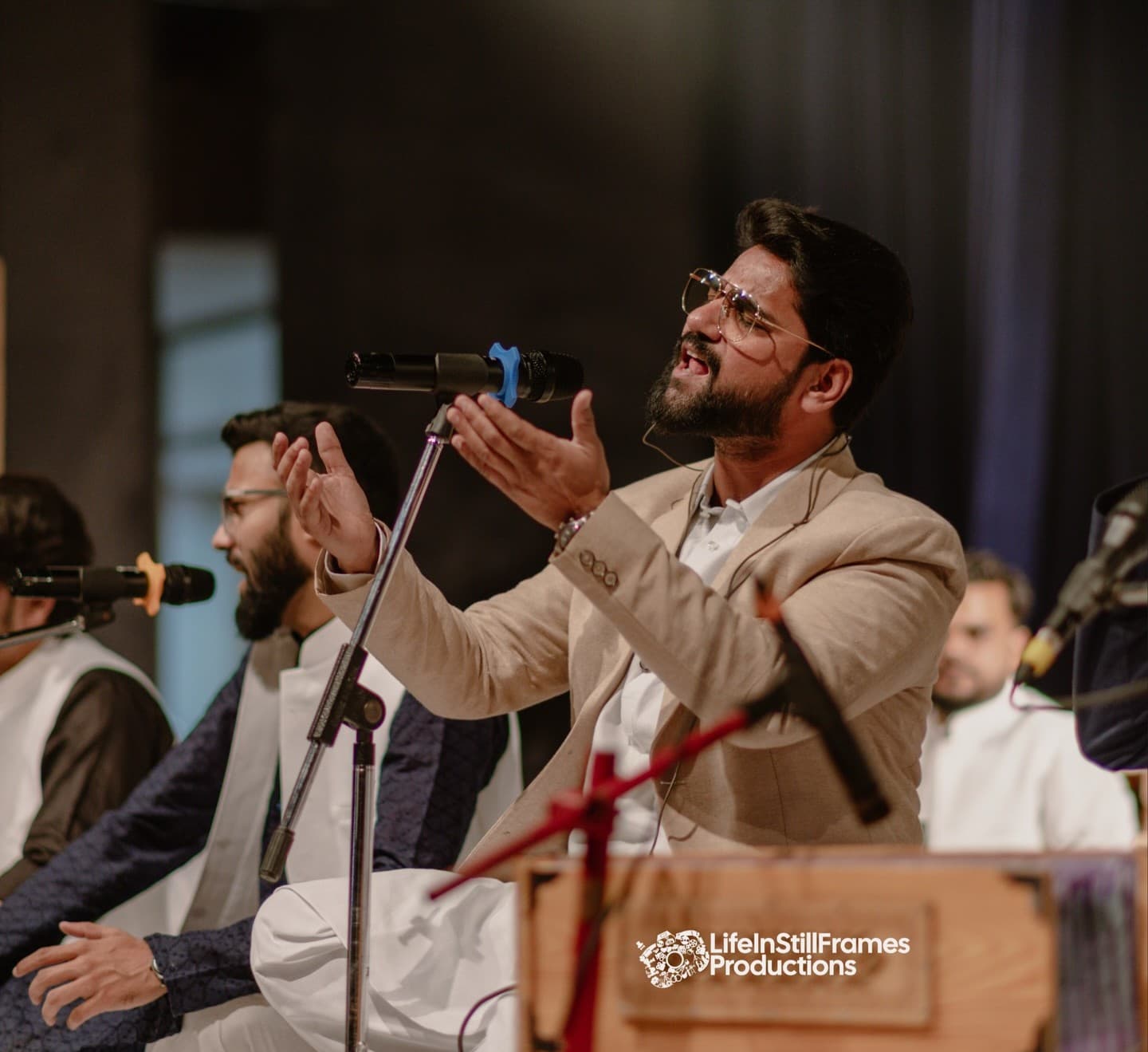 An elegant and professional portrait of Faizan Ilahi, the celebrated cultural artist and Qawwali singer.