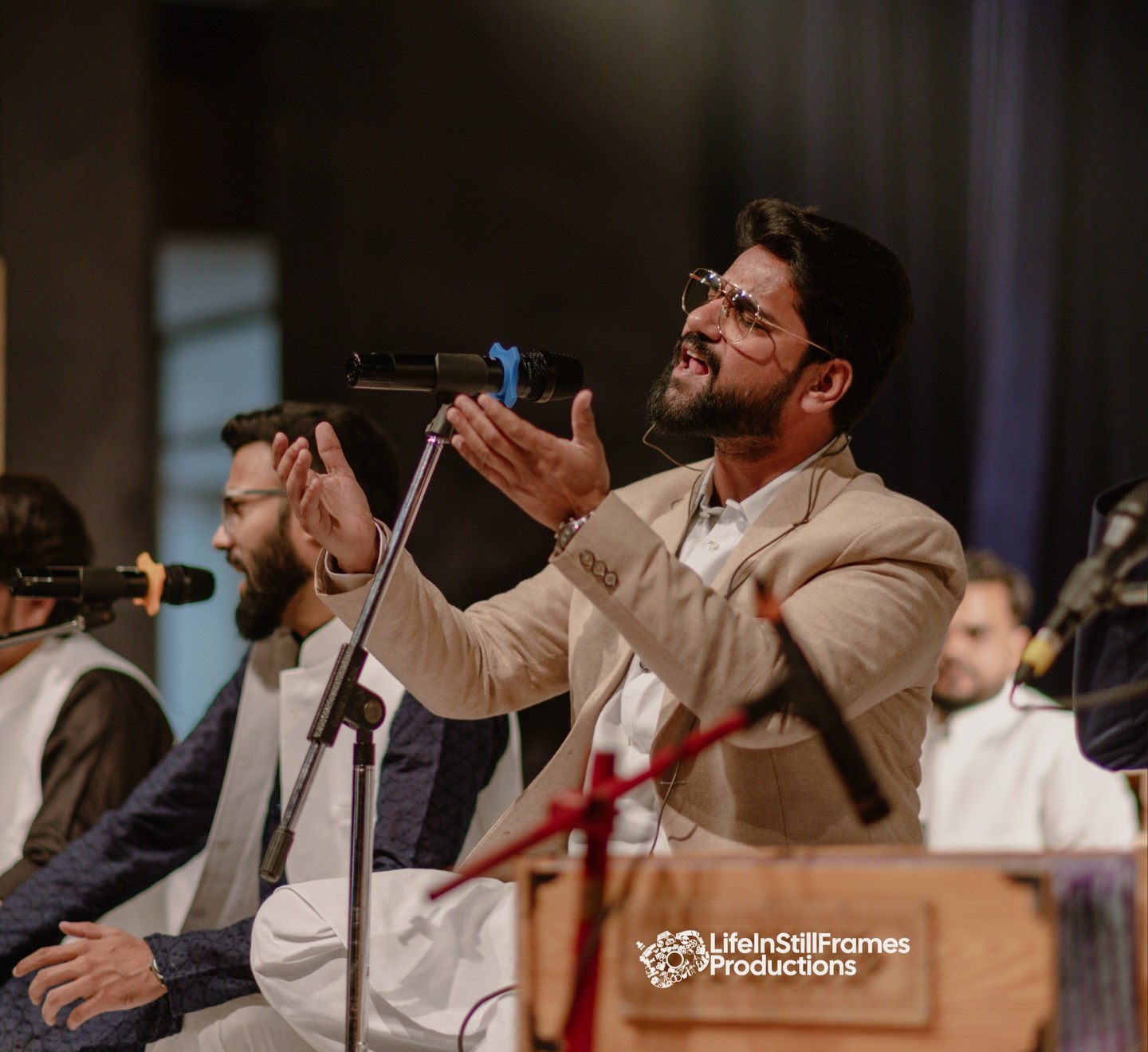 An elegant and professional portrait of Faizan Ilahi, the celebrated cultural artist and Qawwali singer.